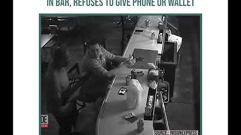 ‘World’s Chillest Man’ sips beer during armed robbery in bar, refuses to give phone or wallet.