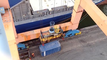 26 Years Old STS Gantry Crane loading a small Containership in the Port of Antwerp