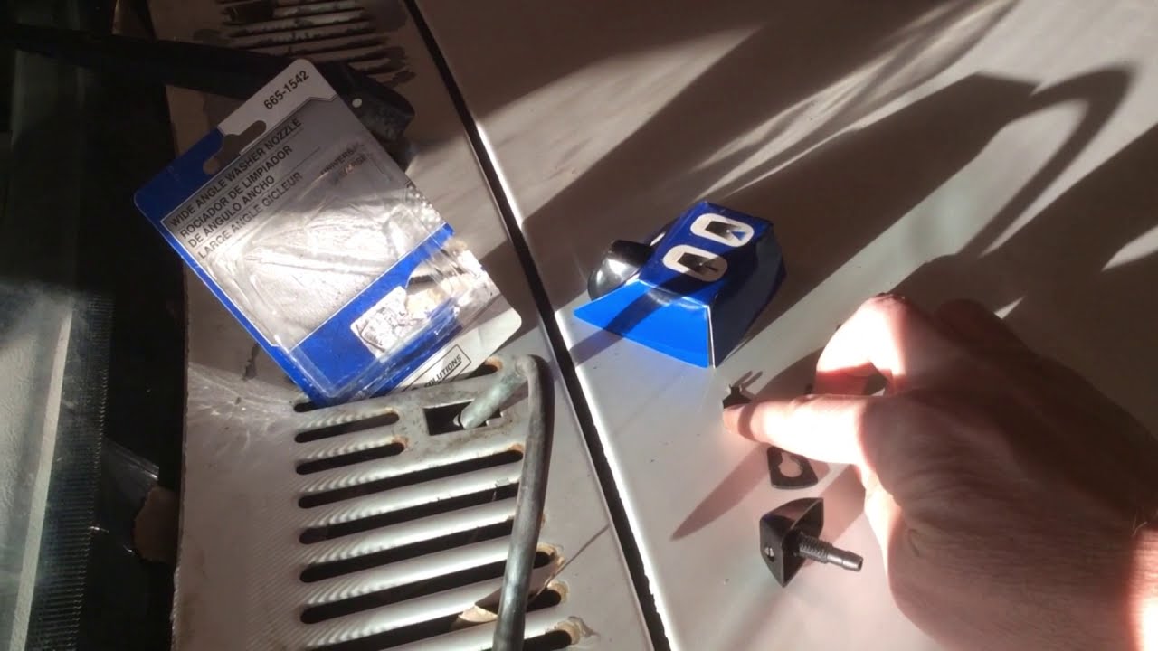 Replacing windshield washer nozzles with NAPA universal kit 6651542 on a 1994 Dodge Daktoa