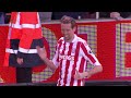 Peter Crouch performs the robot to celebrate his 100th Premier League goal