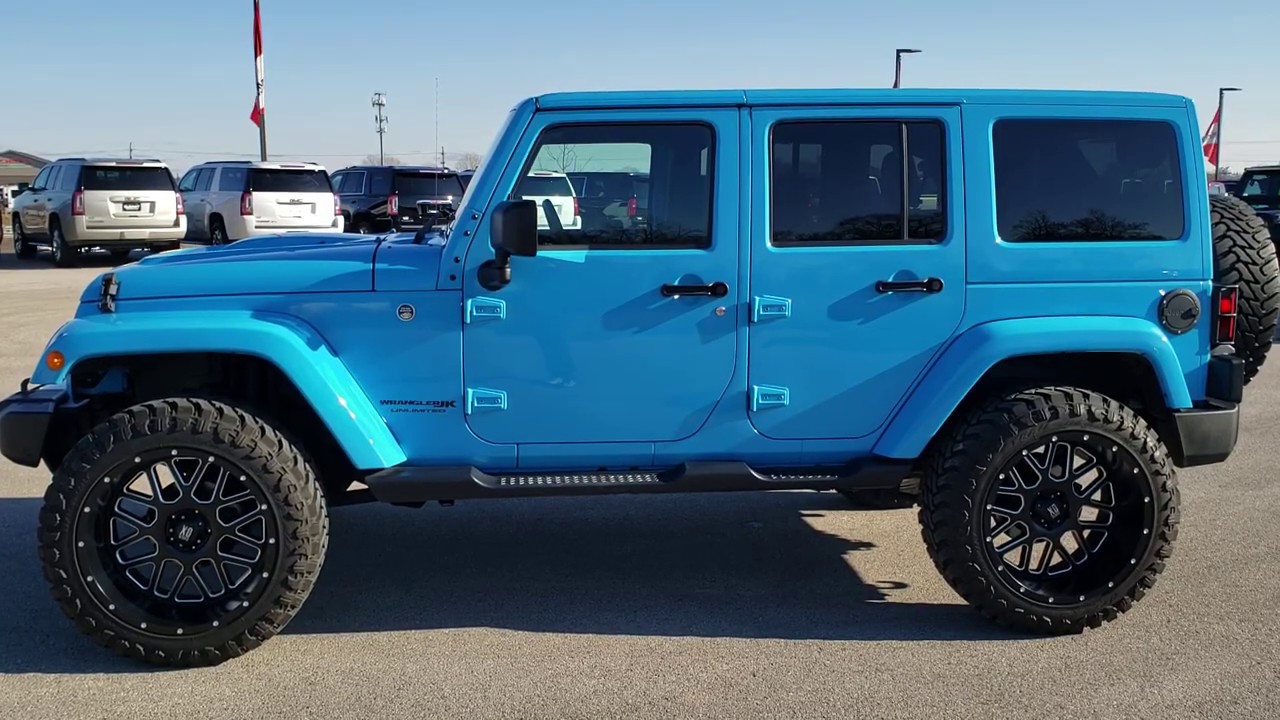 Actualizar 58+ imagen blue jeep wrangler with black rims