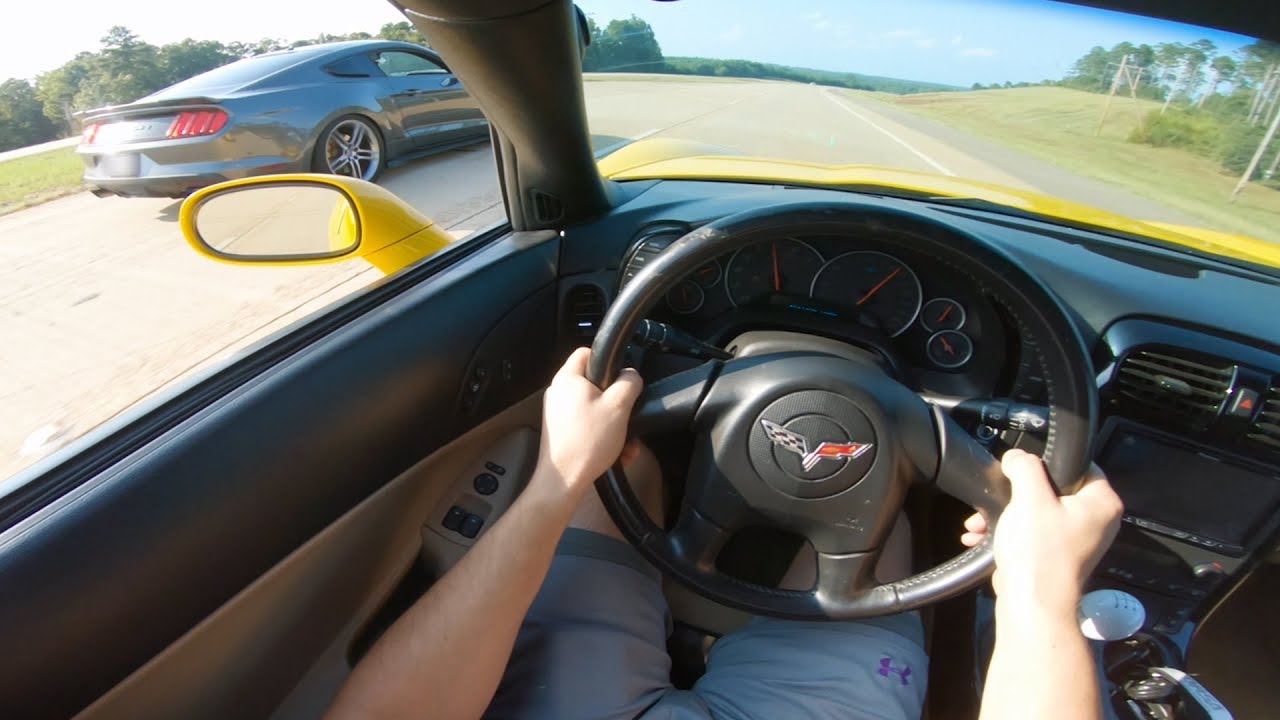 New Corvette's FIRST RACE vs Roush Mustang! - YouTube