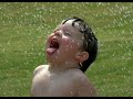 Funny   babies love playing in the rain woababy