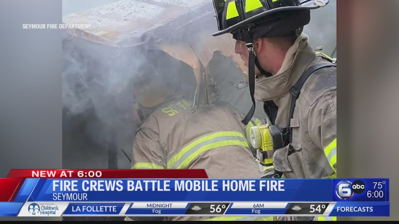 Seymour Fire crews battle mobile home fire - YouTube