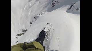 Epic Snowboarding Descent from a Mountain Peak