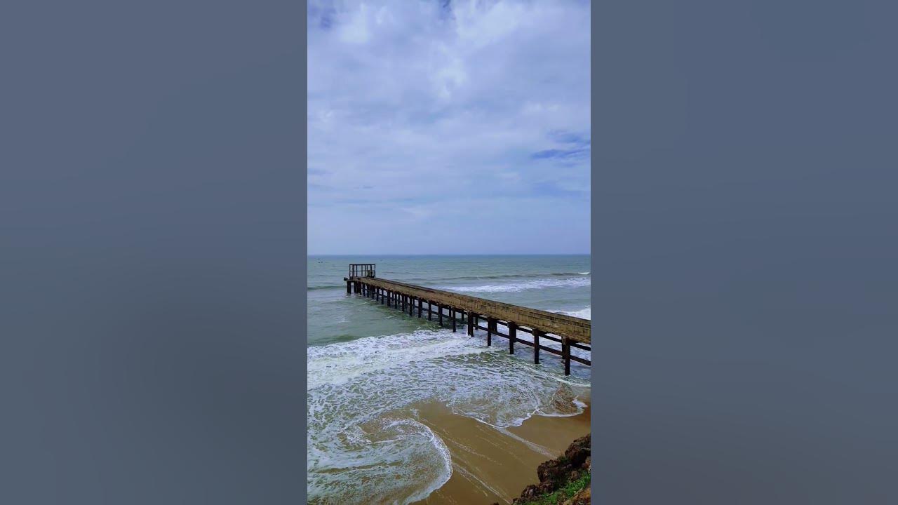 🌊 Waves Meet the Sky – Mesmerizing Ocean Pier View | #beach #trending #peace