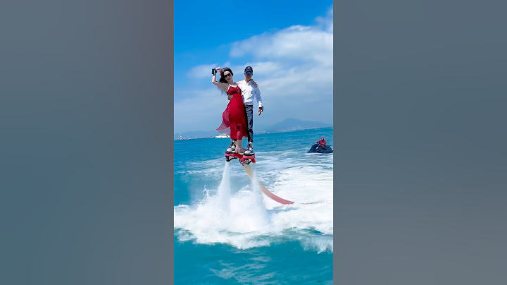 Flyboard ride is so fun😝💃#1314 💦Woman enjoying fly on water #amusementpark #adventure #flyboard