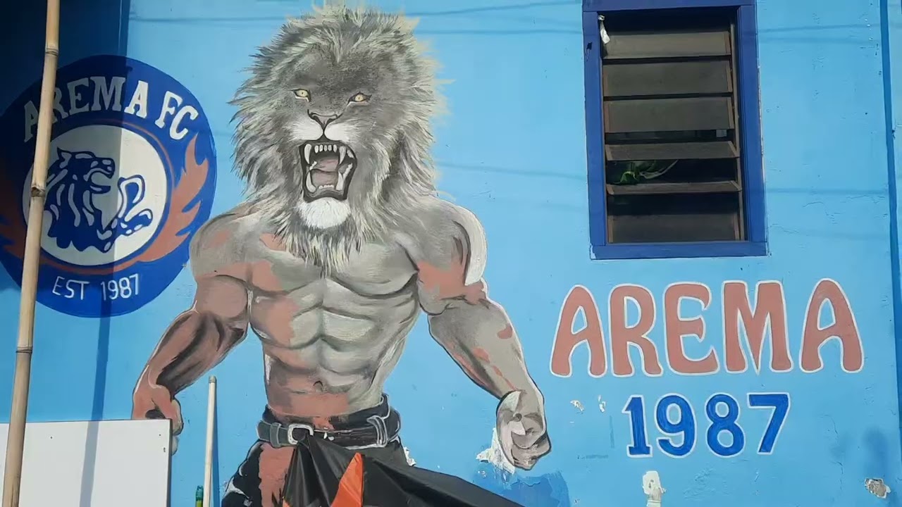 Nelly in rainbow and blue village, Malang, Java