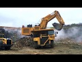 Komatsu PC3000's Loading HD785-7's