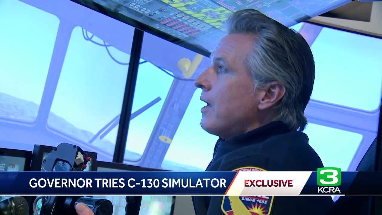 Gov. Newsom tests C-130 simulator as California expands air tanker fleet