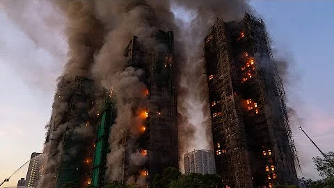 Dozens killed, hundreds missing after massive blaze engulfed Hong Kong apartment complex