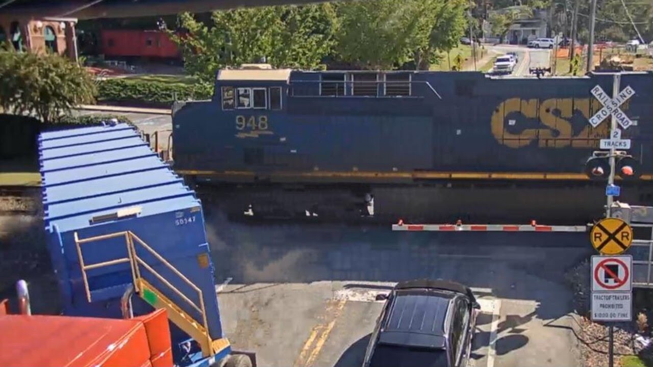 Train, tractor-trailer crash shuts down Cobb County roads - YouTube