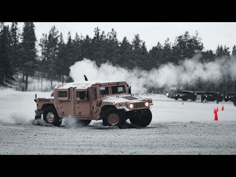 U.S. Marines in Norway learn how to drift armored vehicles on snow