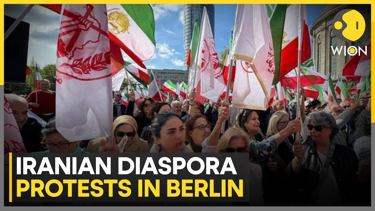 Iranians Protest In Germany: Reza Pahlavi Targeted With Red Liquid | WION