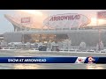 Small army works to clear snow from Arrowhead Stadium, parking lot