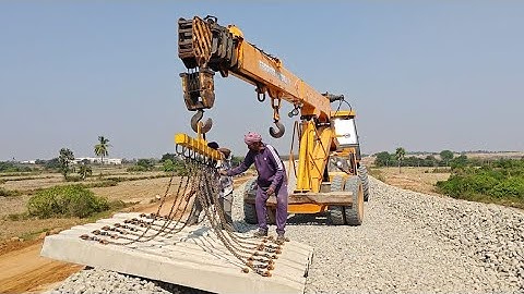 How to railway track sleepers installation with cranes