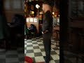 Bar fight  irish pub confrontation  bartender faces off with unruly patron  caught on camera