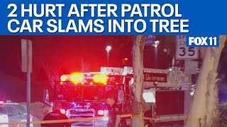 2 hospitalized after CHP patrol car slams into tree  | FOX 11 LA