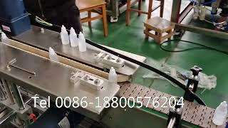 Bottle clamp conveyor belt