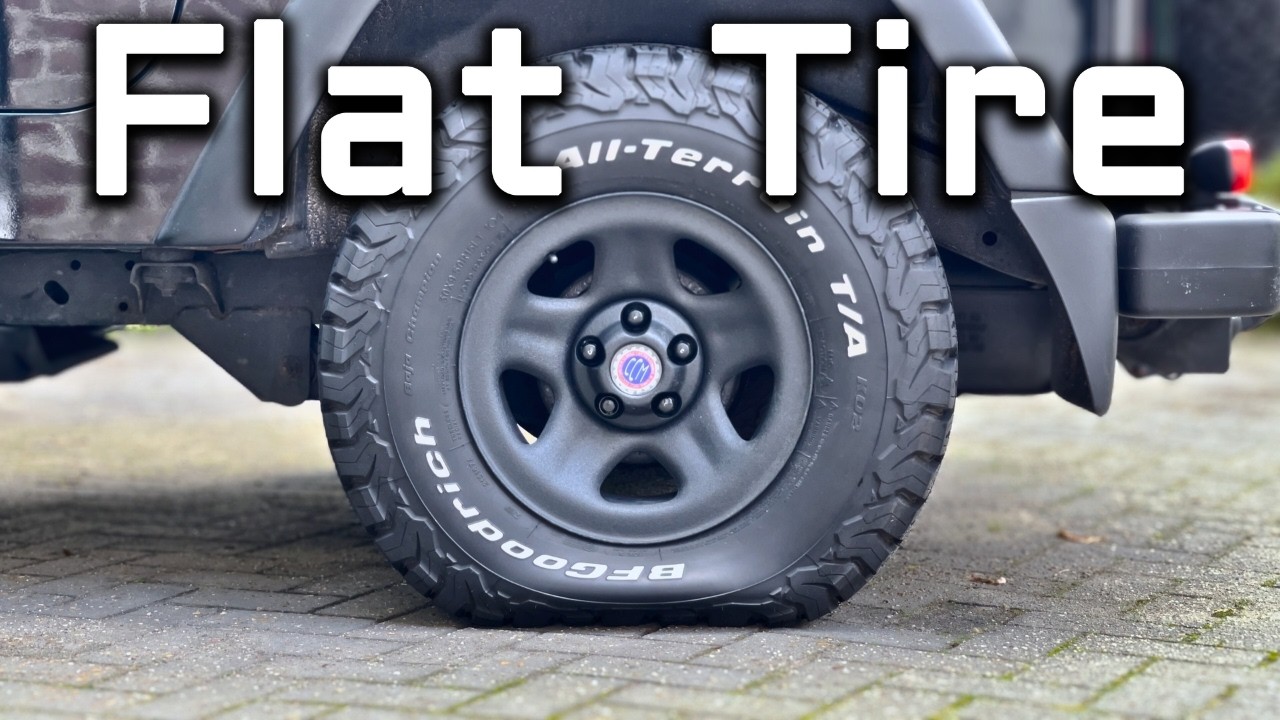 How To EASILY Change a Flat Tire | Roadside Fix - YouTube