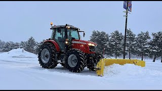 Massey Ferguson Tractor Plowing Snow with 110" Snow Wolf Quattro Plow