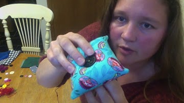 Sewing buttons on the pincushion PHS Sewing