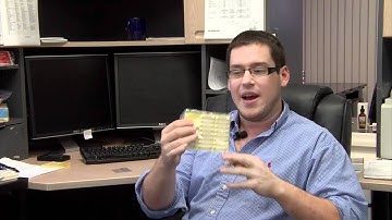 Are there different types of name badge backings?