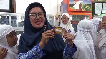 KANTIN DENGAN SISTEM PEMBAYARAN UANG ELEKTRONIK E MONEY