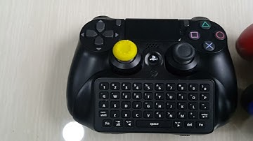 PS4 mini keyboard chatpad and power charging dock from sony brand. Both S$49 timsggame
