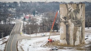 Incredible art: Australia's Guido van Helten is painting this Iowa silo with a wrap-around mural
