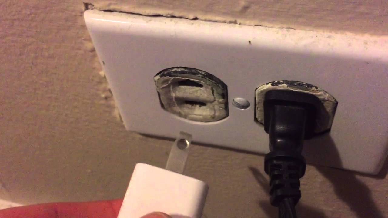 Plugging in iPhone charger to wall YouTube