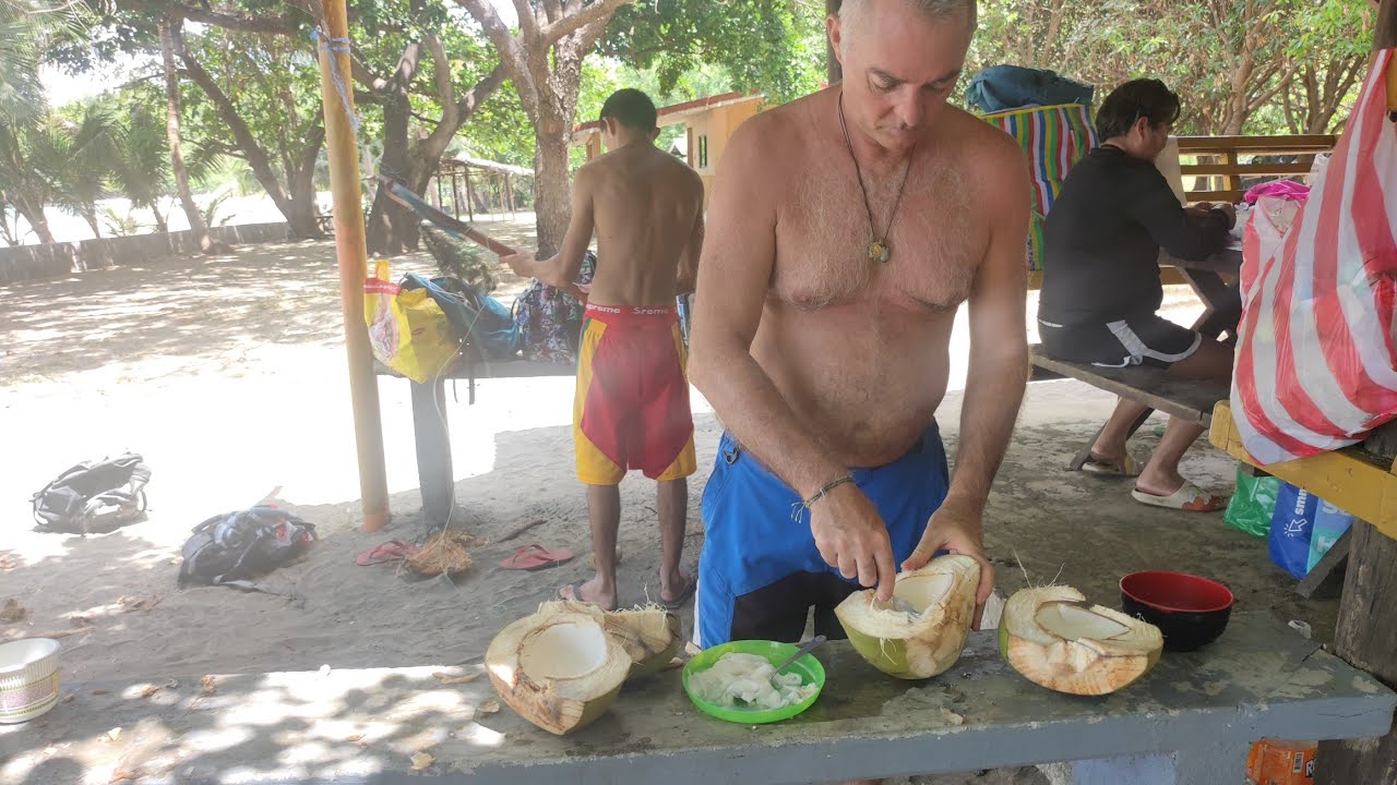 My French Son Trying taking off Coconut Husk ..No Itak ..Kaya Kaya ?