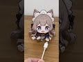 Sandrone cat who loves playing with charging cables