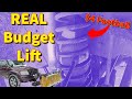 How To Lift a Jeep with WalMart Footballs (CHEAPEST LIFT KIT EVER?)