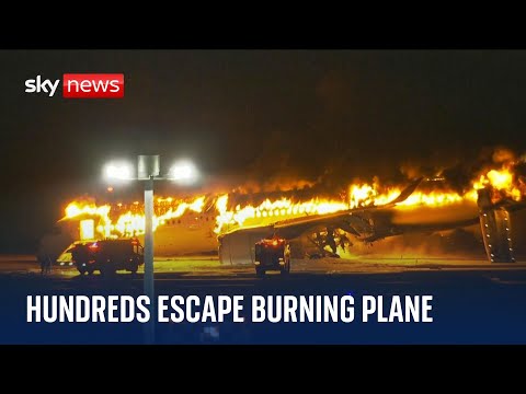 Japan plane fire: Passengers evacuated after planes collide at Tokyo airport