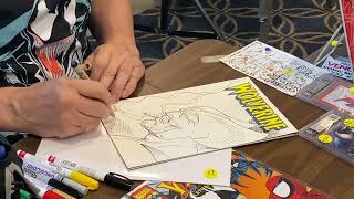 Sam De La Rosa does a Wolverine on a Blank Comic Book cover at the 2022 Sarasota Comic Con Part 3