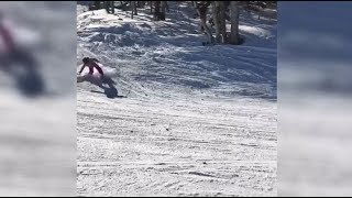 Skier Takes Big Fall Off A Little Jump