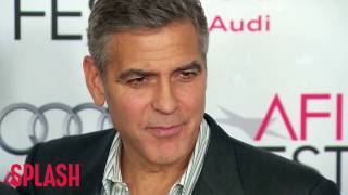 Learn How George Clooney Schmoozes Like a Pro | Splash News TV