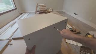IKEA SEKTION wall top cabinet 30" x 15".Above the fridge/freezer cabinet.  Unboxing and assembly. 