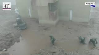 Japan: Rescue efforts after heavy rain triggers floods, landslides