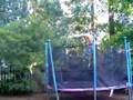 Guy does crazy flip off trampoline