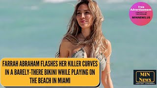 Farrah Abraham flashes her killer curves in a barely-there bikini while playing on beach