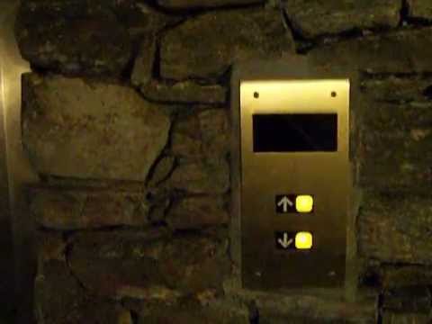 Glass Dover Elevator with Red and White Directional Indicators at Grove ...