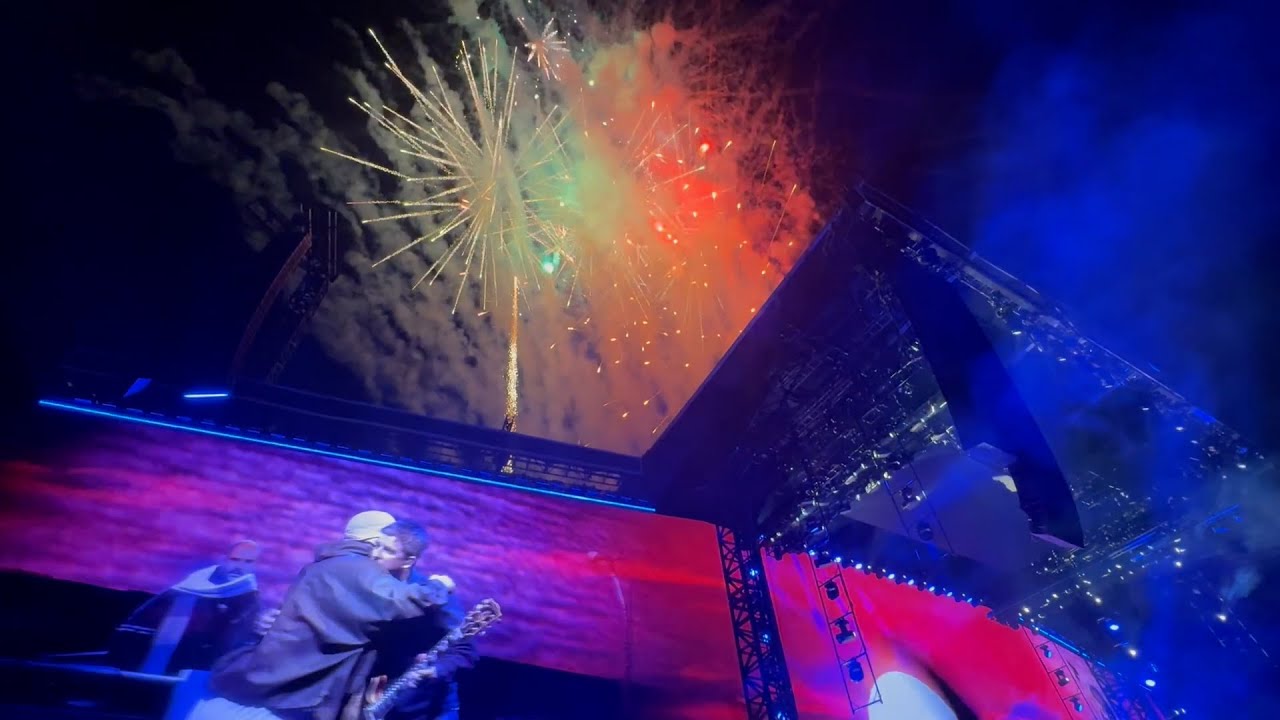 Oasis's Liam and Noel Gallagher hug during post-show fireworks display at Dublin's Croke Park