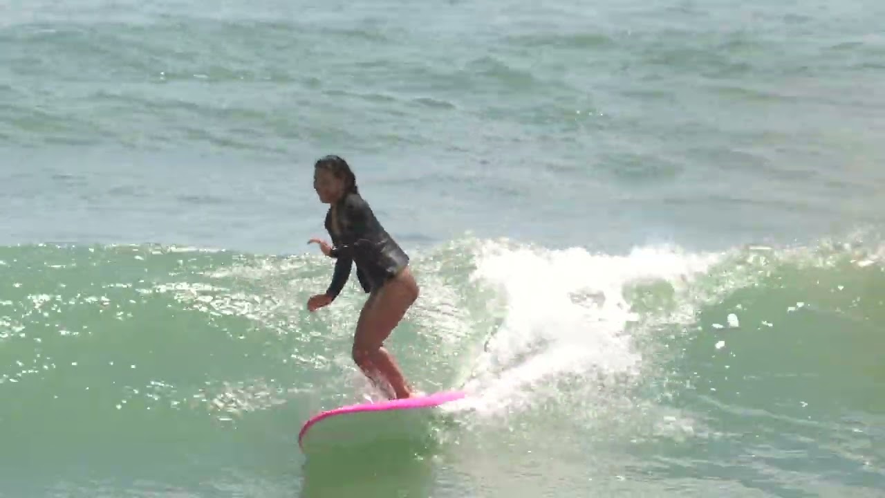 smiling all the way. Surfing Arrawarra.