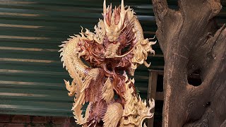 : Carved woodart into Dragon and Phoenix statues