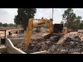 Roller And KOMATSU PC 210 Excavator Working