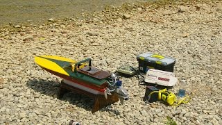 R/C boat with O.S. outboard engine