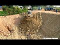 Perfectly Showing Project Canal Slope Foundation By Dozer Pushing &amp; Truck Dumping Stone On Downhill