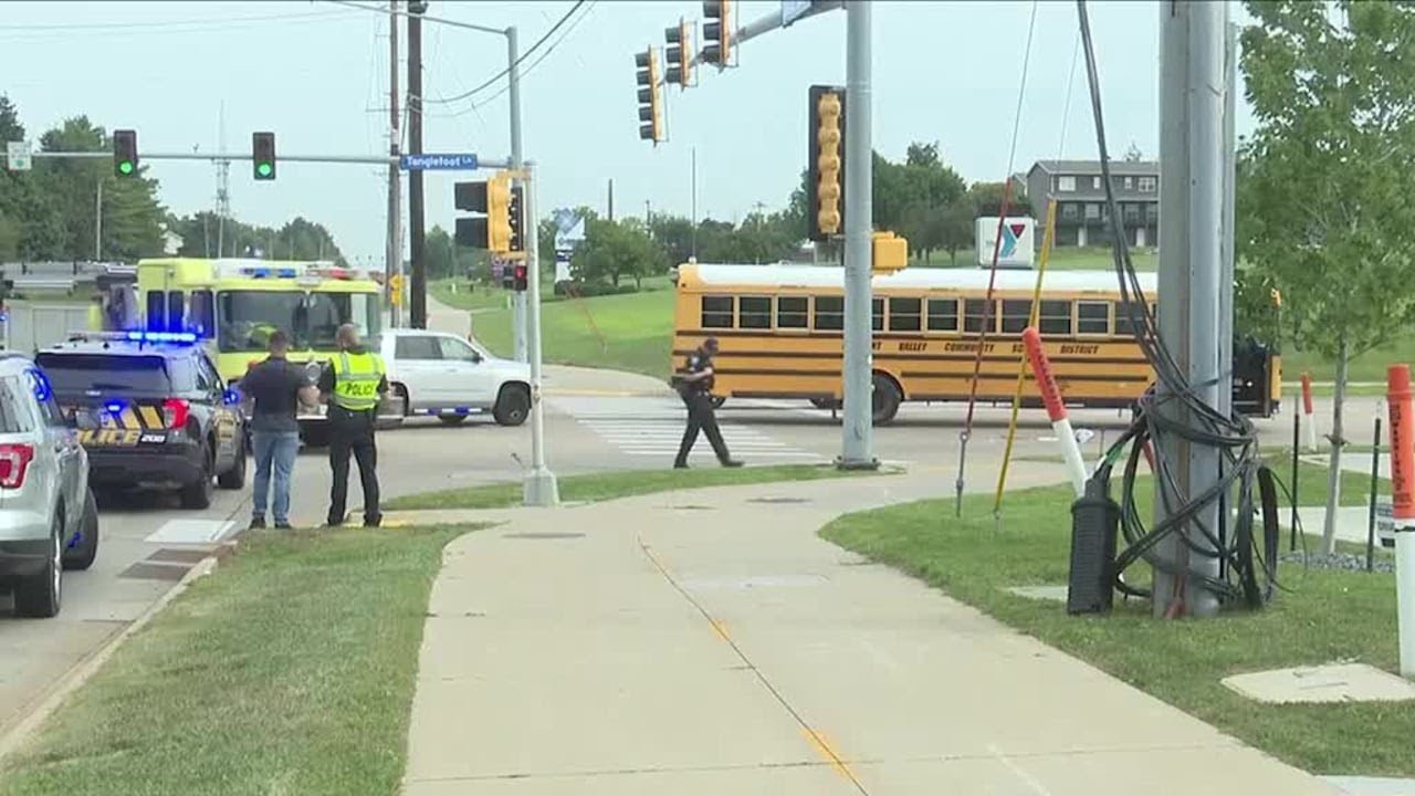 Man seriously injured after being struck by school bus - YouTube